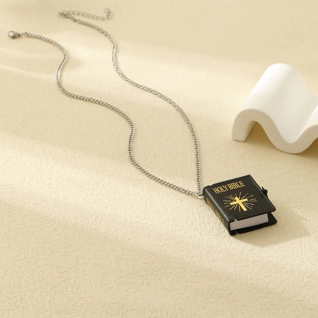 Stylish stainless steel cross necklace with Bible verses pendant, available in gold, silver white, and silver black.