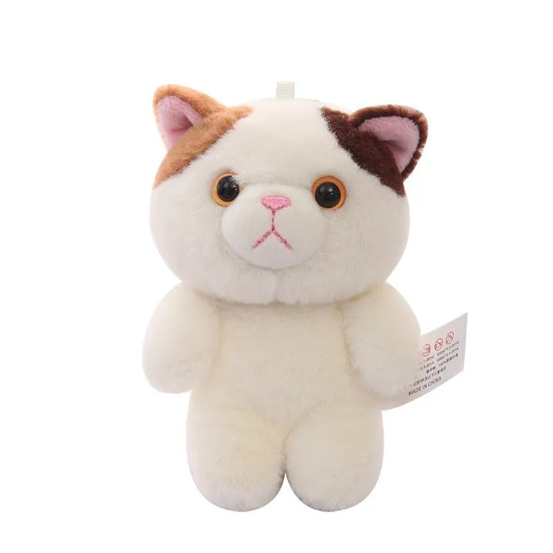 Cute cat sister doll soft plush 10cm tall with yellow eye beads on a table