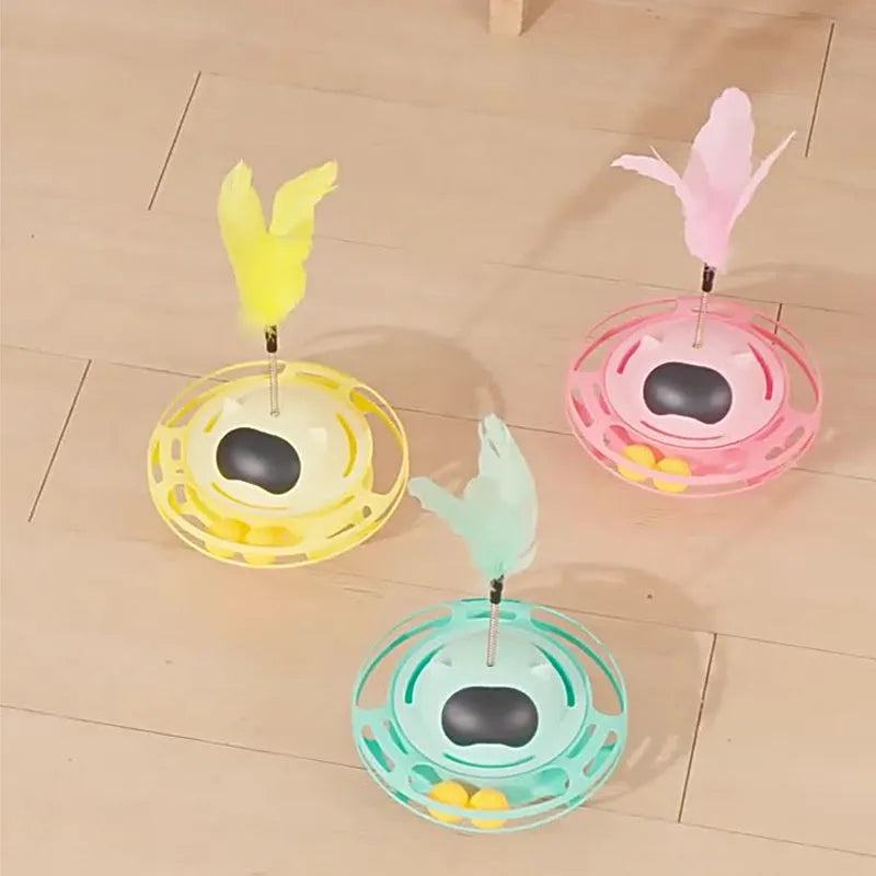 Pink cat tumbler turntable toy measuring 17 cm by 10 cm on a flat surface