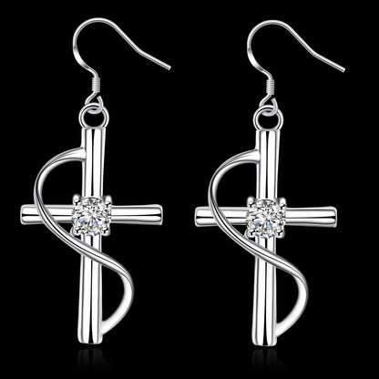 Gold-plated elongated cross earrings in white metal, minimalist design