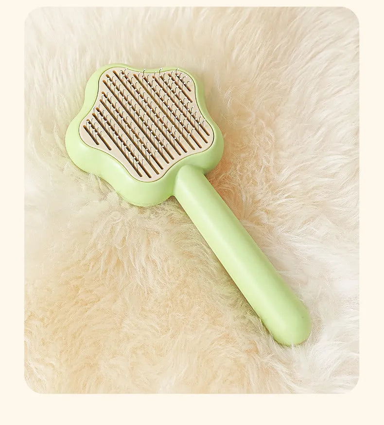 Green stainless steel cat grooming comb with four different needle surfaces for pet hair removal