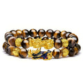 Handmade tigereye hematite unisex stone bracelet with silver-strip finish on a white background