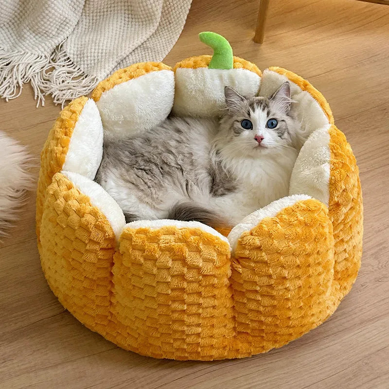 Pumpkin-shaped pet bed with raised sides in two sizes for cats and small dogs