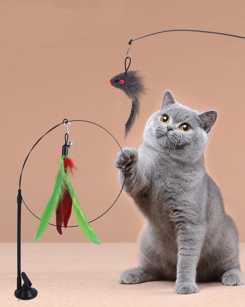 H Hot-selling sucker cat teaser with blue flying fish replaceable head, steel wire arm, and PP construction on a window