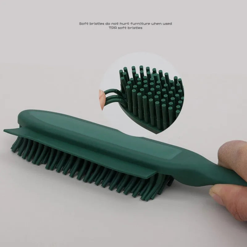 Green dog brush with grooming comb, massage pins, and removable sticky roller for pet hair removal