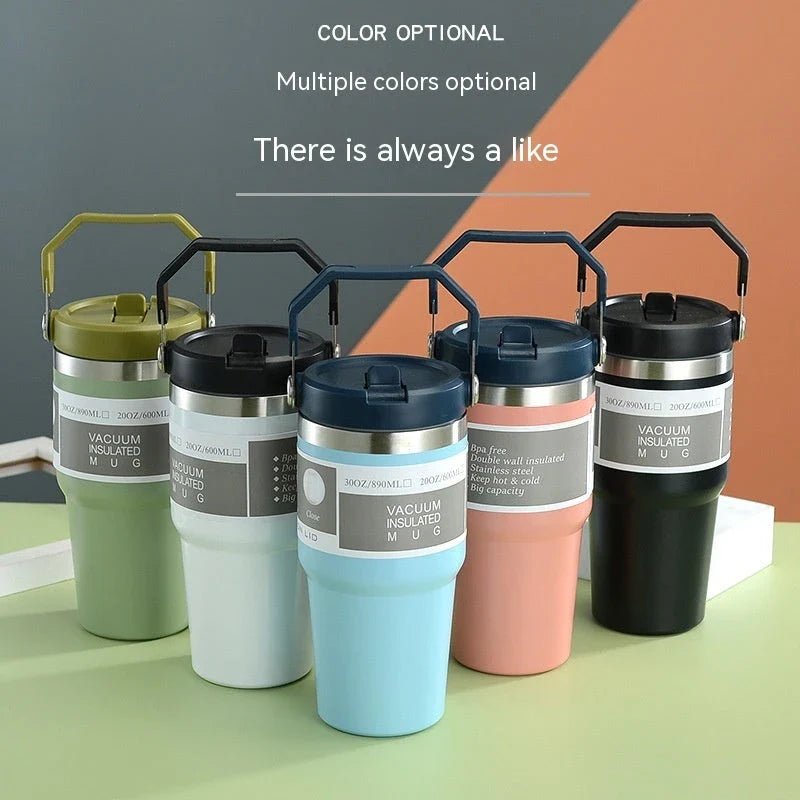 Insulated stainless steel travel tumbler with double-wall vacuum technology, sweat-proof powder coating, and BPA-free sliding lid for hot and cold drinks on the go.