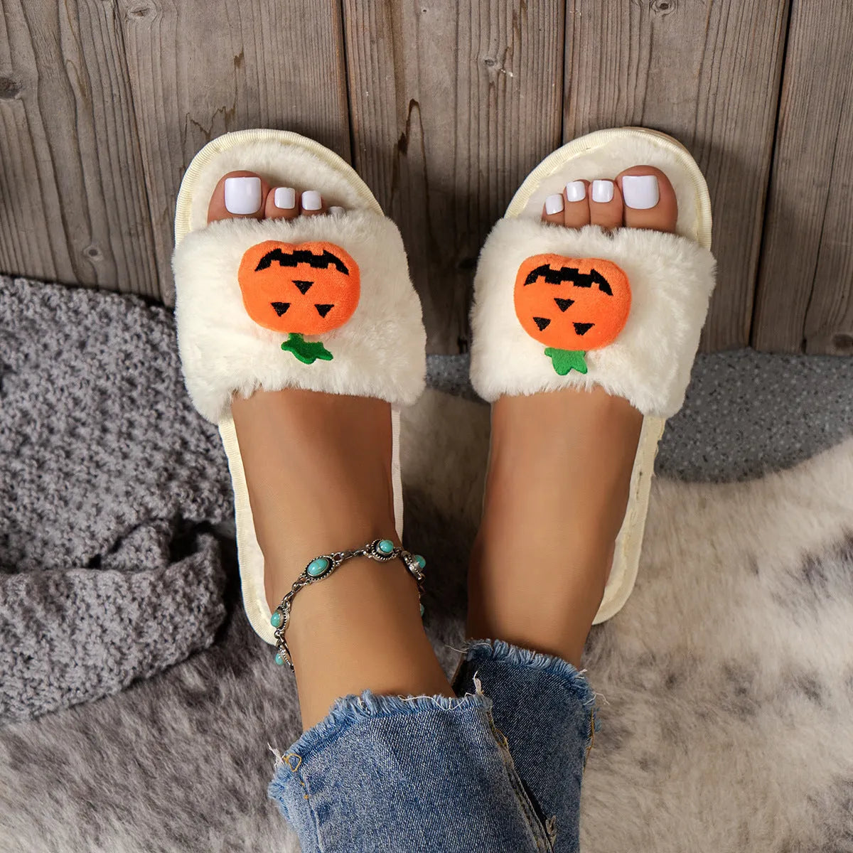 Halloween pumpkin cartoon plush slippers with synthetic fur upper and PVC sole in white or yellow