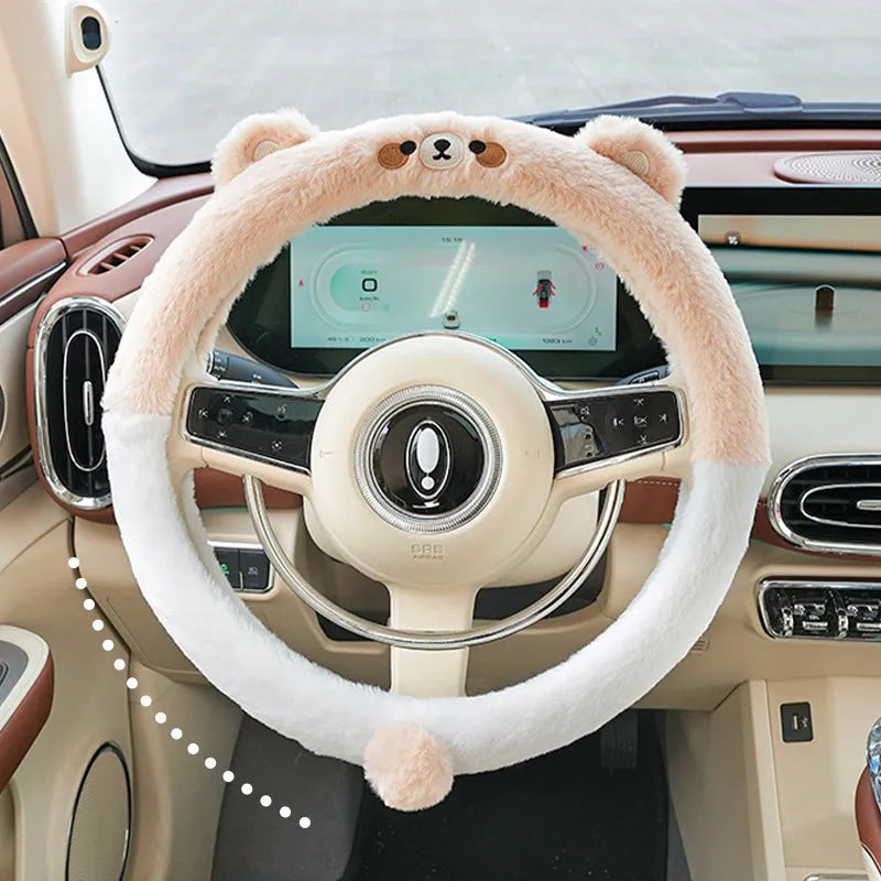 Plush rabbit fur steering wheel cover with embroidered panda design, shown fitted on a car wheel.