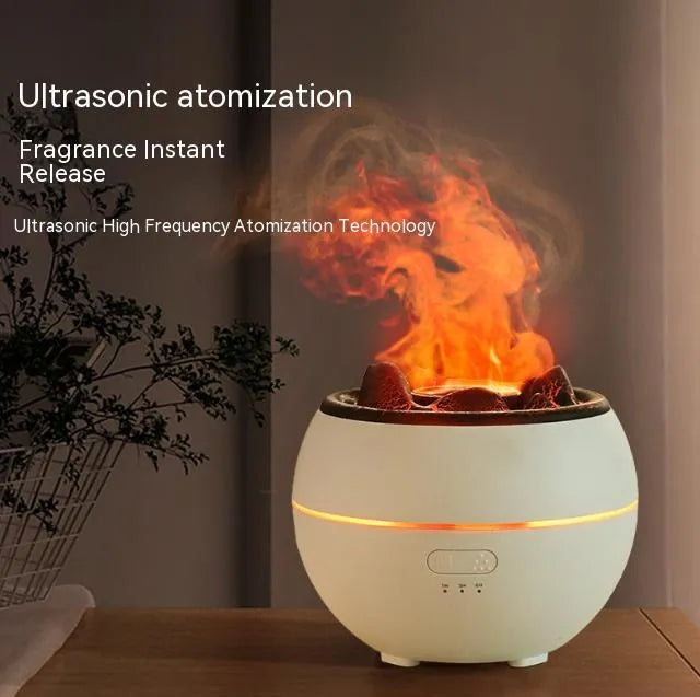 White round flame aroma diffuser and humidifier with water tank on a wooden desk