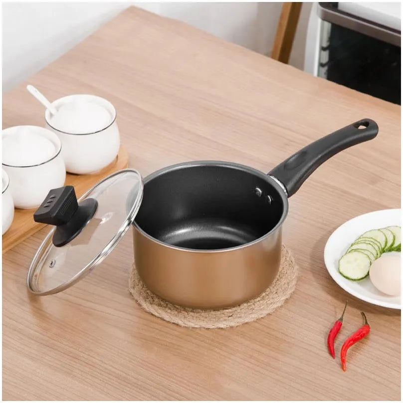 Three-piece cast iron cookware set showing a soup pot, milk pot, and wok with light luxury finish.
