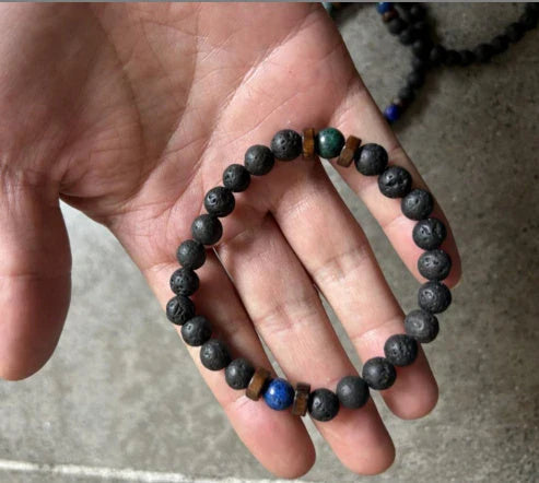 Men's black volcanic stone bracelet with unique stone combinations