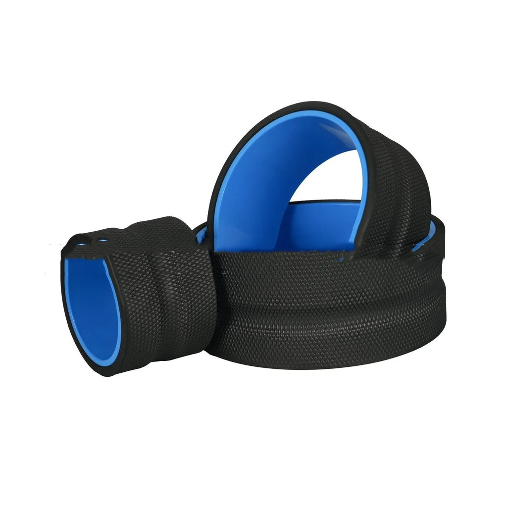 Black yoga wheel four-piece set with foam roller, Pilates ring, and stretching strap on a floor