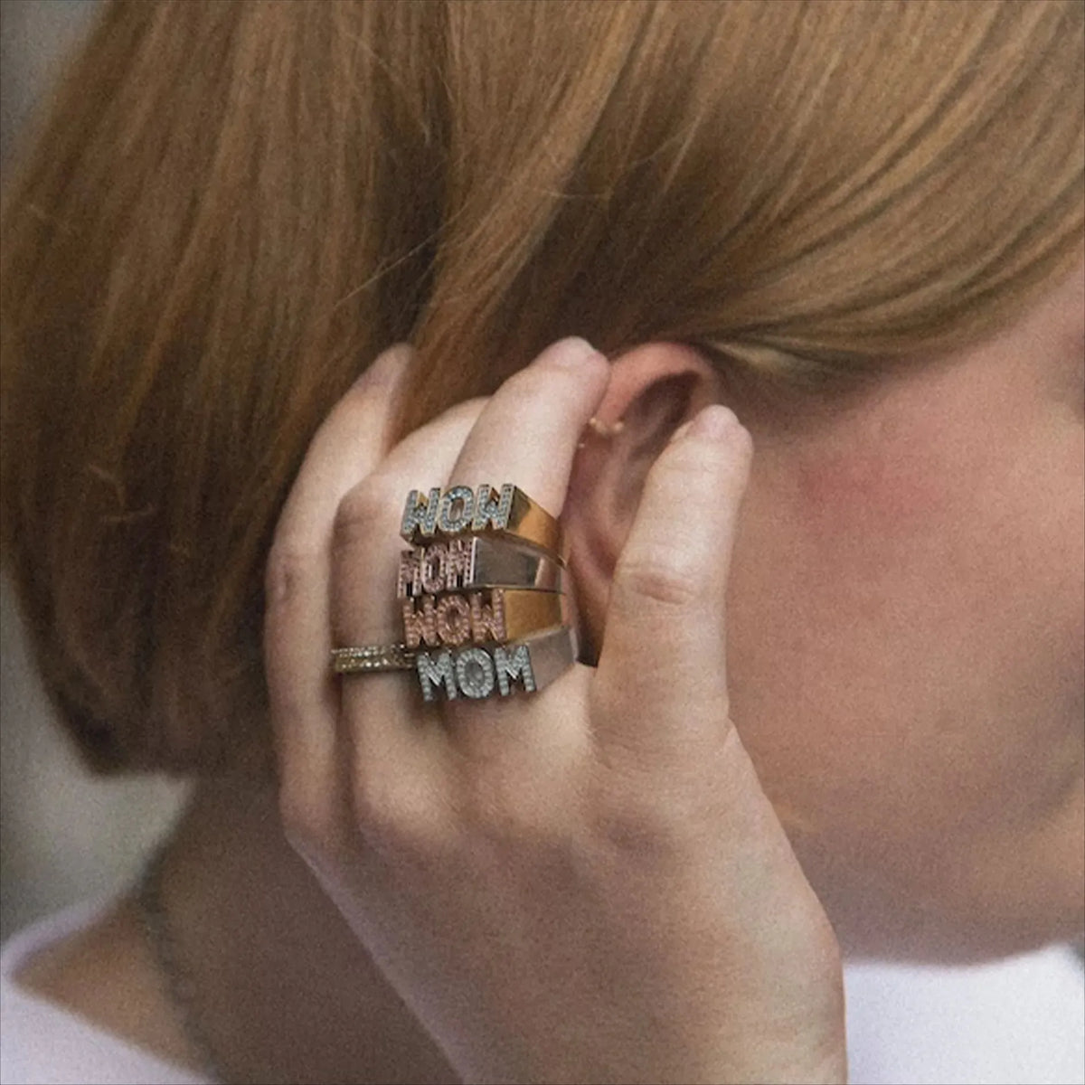 Copper open mouth ring with electroplated finish, six colour options including pink diamond gold and blue diamond silver, letter motif