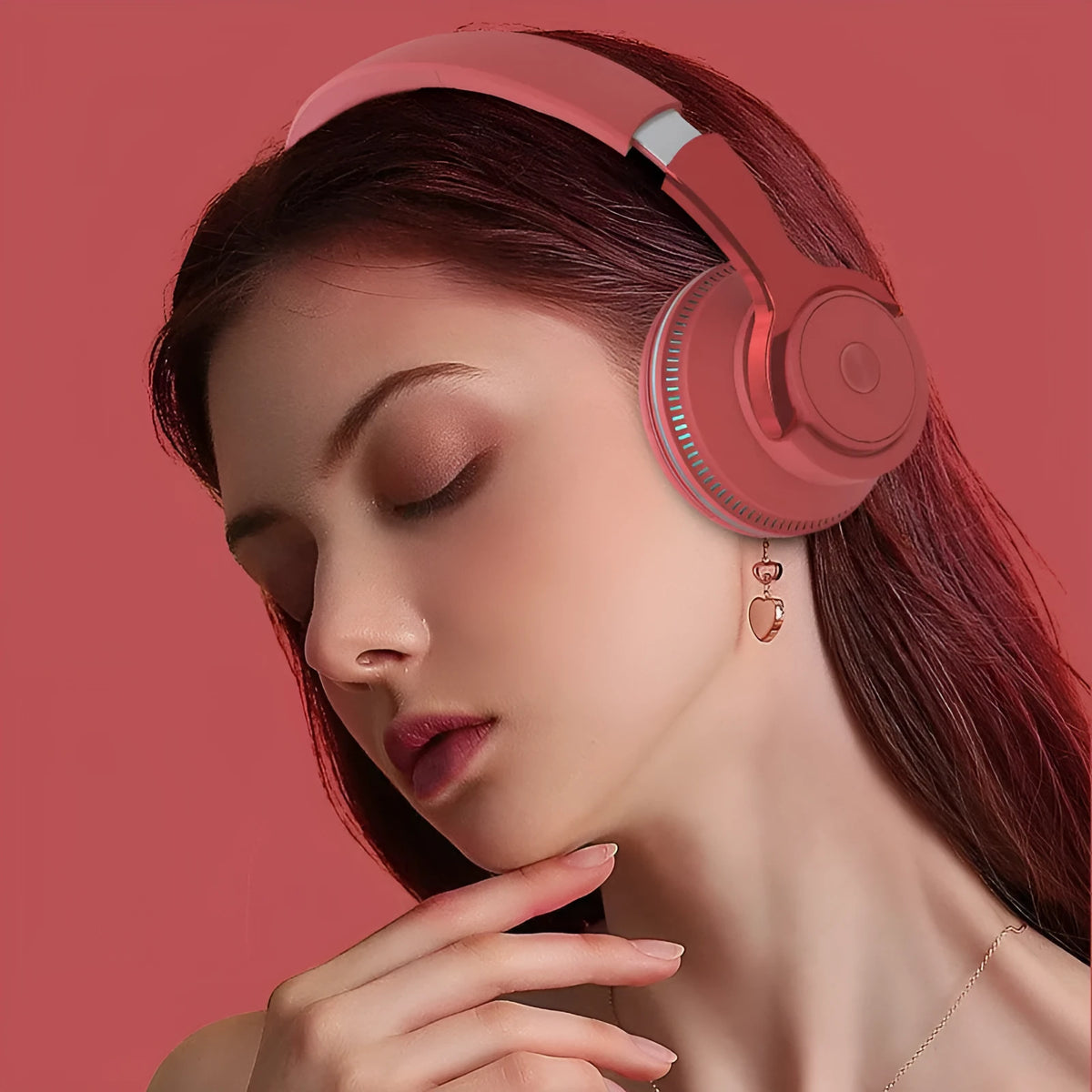 Wired stereo computer headset with subwoofer card in matte black finish, compact over-ear design