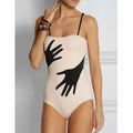 Women's one-piece bikini swimsuit with gauze skirt overlay in polyester fabric