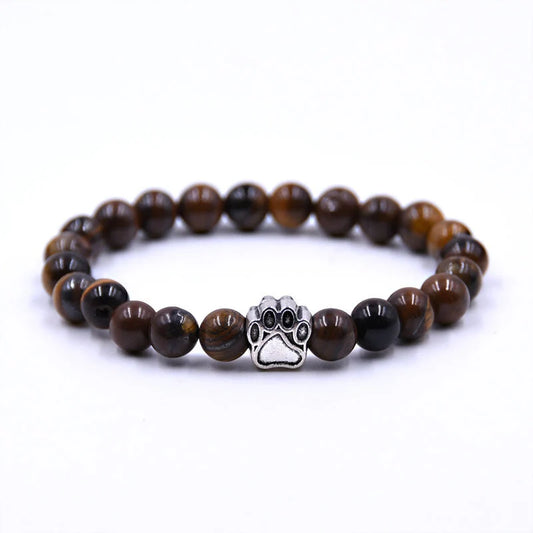 Natural stone dog paw bracelet featuring tiger eye and volcanic stone in a unisex design