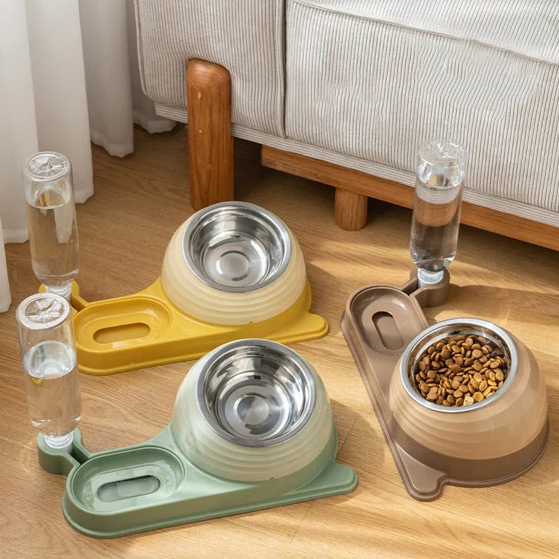 Elevated cat food bowl with attached water dispenser bottle in green colour