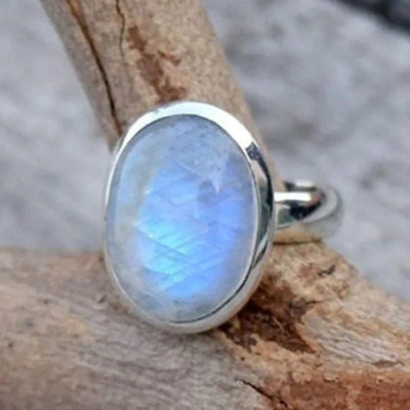 Vintage Thai silver moonstone ring with flower design in silver colour on alloy base