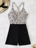 Women's one-piece leopard print crossover lace up slimming hip swimsuit in black and white leopard print