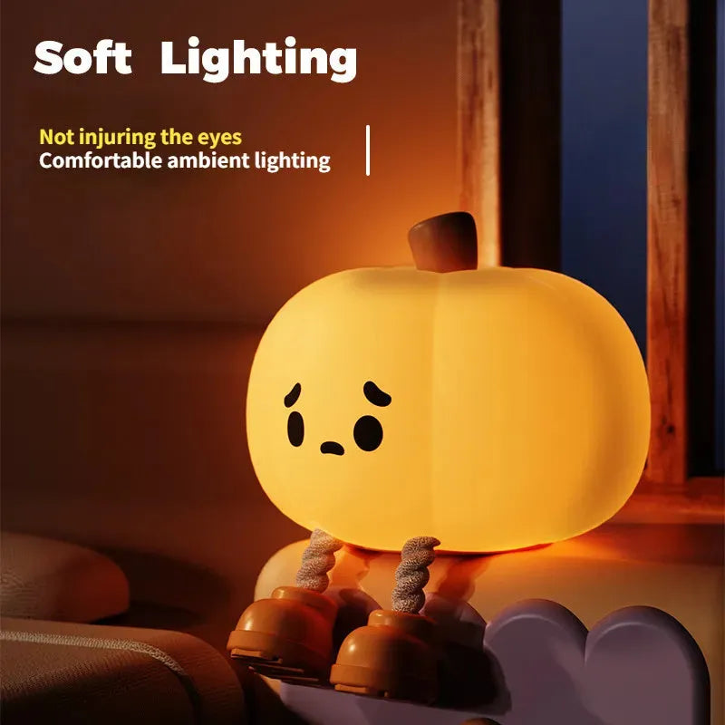 Soft silicone pumpkin night light with touch controls and warm LED glow