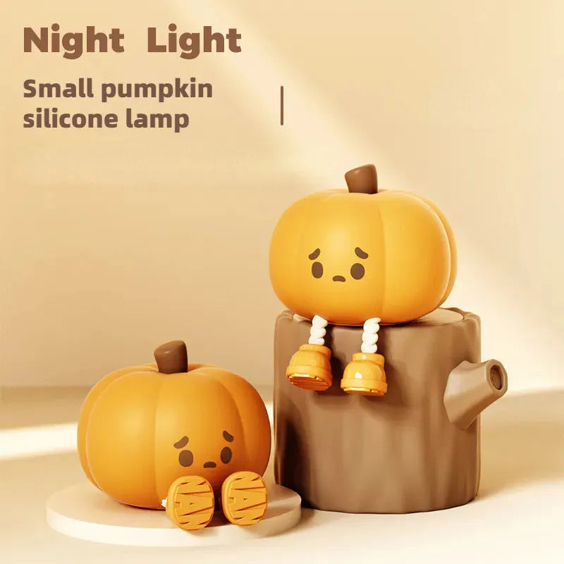 Soft silicone pumpkin night light with touch controls and warm LED glow