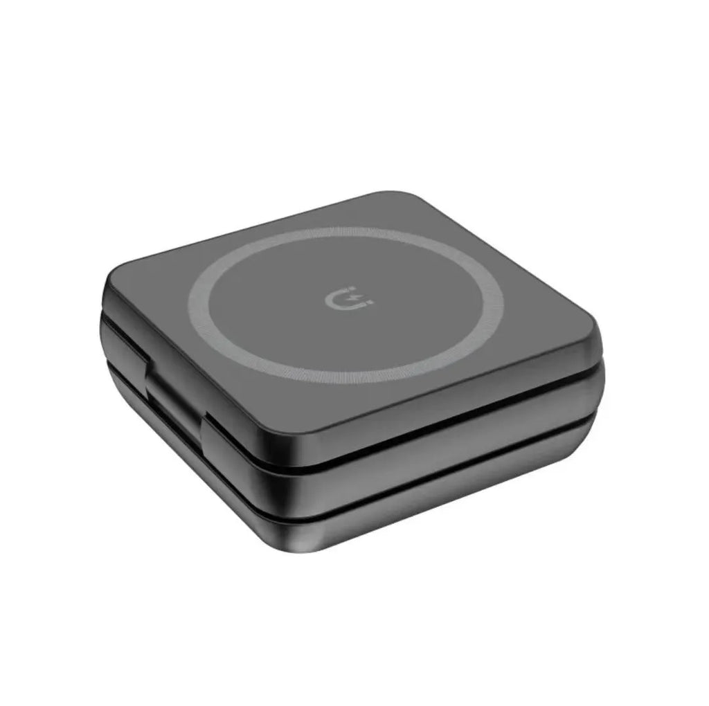Folding three-in-one magnetic wireless charger in black with Type-C cable and EU plug on a desk