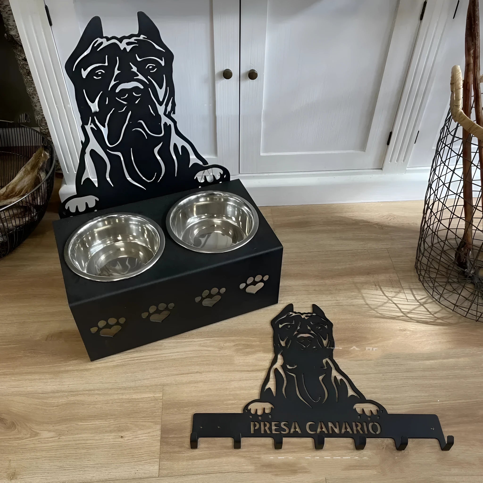 Personalised dog food bowl holder with iron dog head and stainless steel bowl, showing custom name engraving.