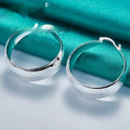 Silver metal round concave earrings for women, metal finish, 2.5 cm diameter, natural circle style