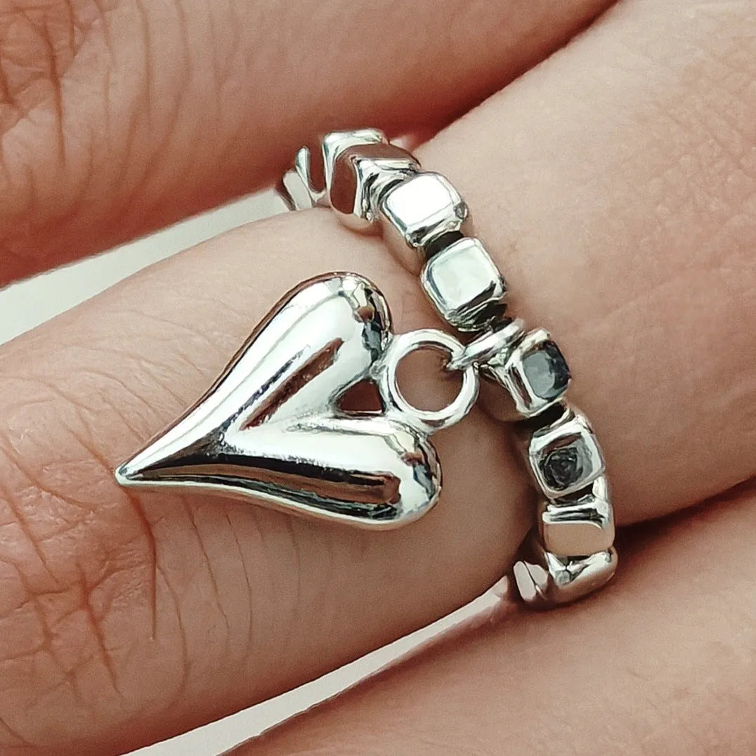 Handmade beaded elastic ring with geometric heart design in gold or silver electroplated finish