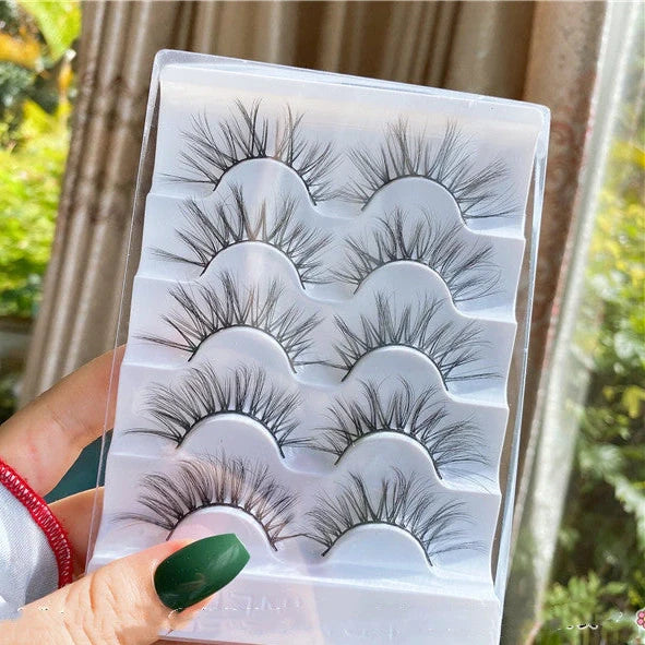 Black false eyelashes with 13mm length and curled messy cross pattern design