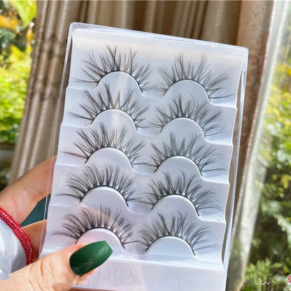 Black false eyelashes with 13mm length and curled messy cross pattern design