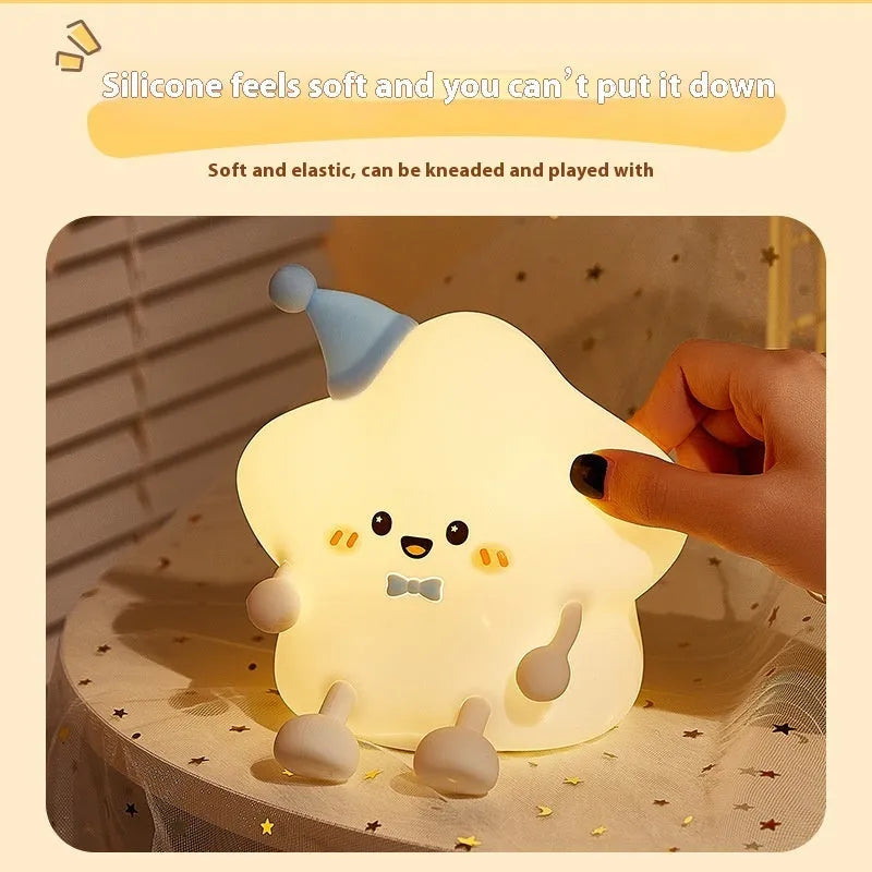 Cute Timing XINGX Pat night light in cartoon geometric stereo style with remote control on a table