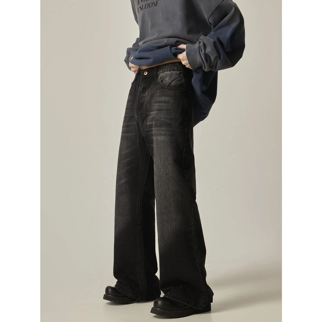 Black loose straight leg jeans with retro American styling and zipper fly