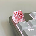 High transparency resin starry sky keycap for mechanical keyboard in green, pink, red, and violet colours.