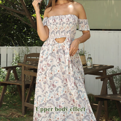 Women's off-shoulder strapless floral dress in a vibrant pattern, perfect for summer outings.