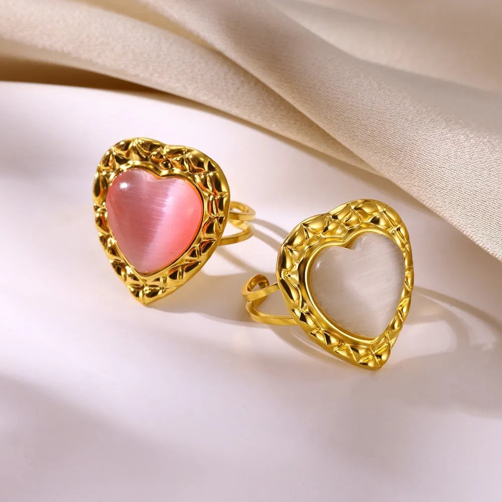 Retro stainless steel heart-shaped pendant ring with adjustable open band and electroplated finish, white background