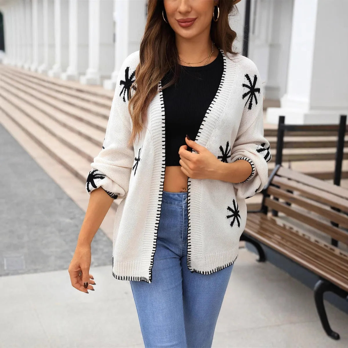Plus size beige knitted coat with jacquard flower pattern, loose fit, cardigan style.