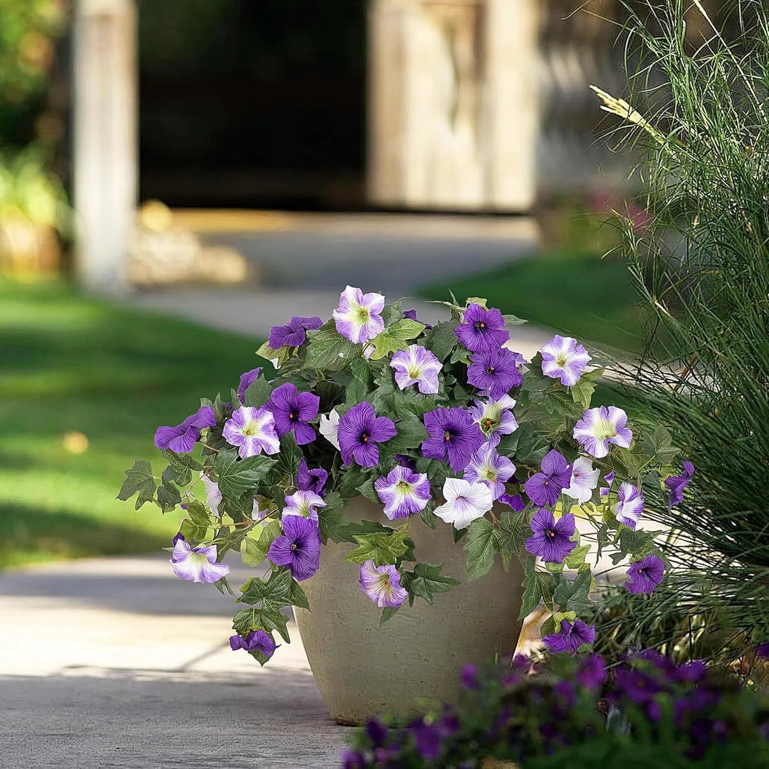 Plastic decorative flower container with 12 fork stems holding colourful artificial flowers