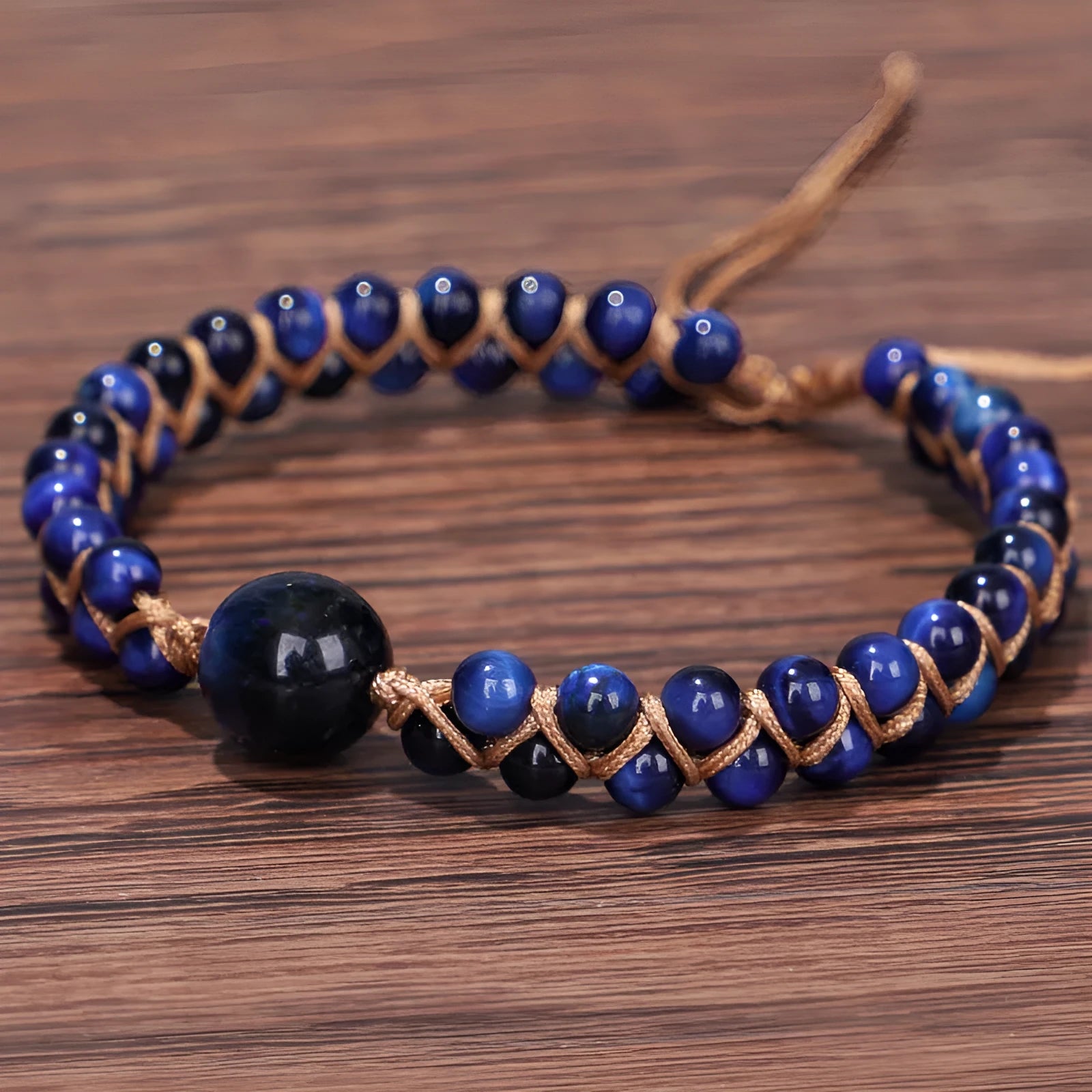 Handmade woven geometric bracelet with tiger eye stone beads and adjustable pull cord