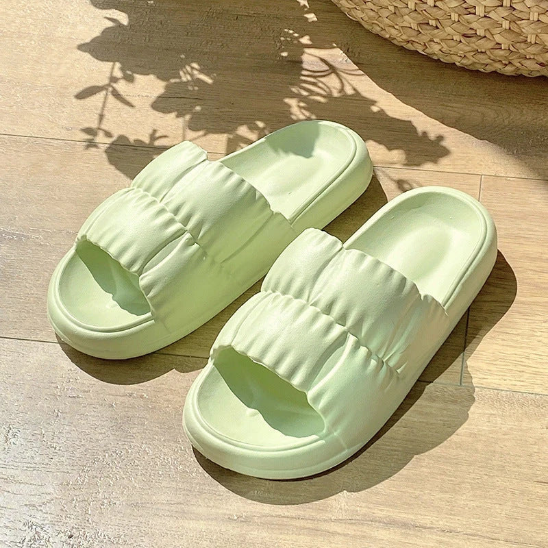 Plush Bathroom Slides in various colors and designs, featuring a soft, comfortable EVA sole and breathable upper material.