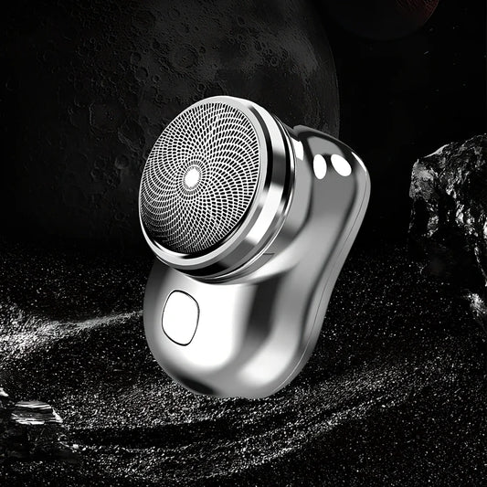 Compact electric mini shaver in cool silver with floating cutter head, 65.8 x 46 x 42mm size, rechargeable for 60+ minutes use
