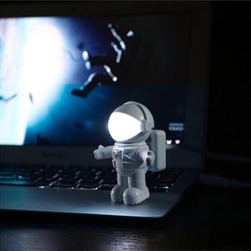 Astronaut USB Desk Lamp with flexible gooseneck arm and unique helmet switch