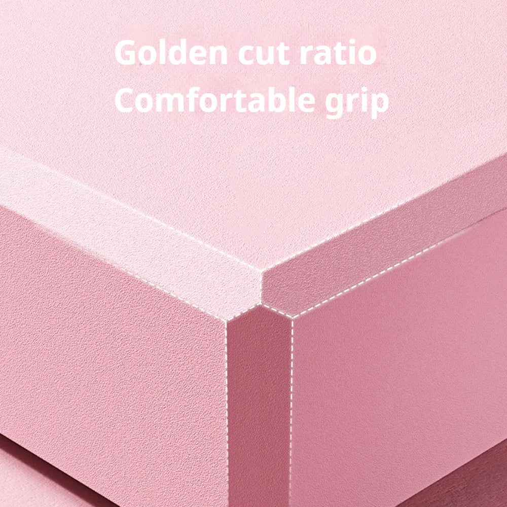 Solid colour EVA foam yoga block showing hexagonal facets with ridges, measuring 23x15x7.6cm