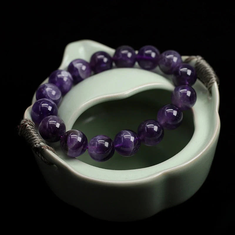 Natural Fantasy Amethyst Bracelet with adjustable string and vibrant amethyst beads