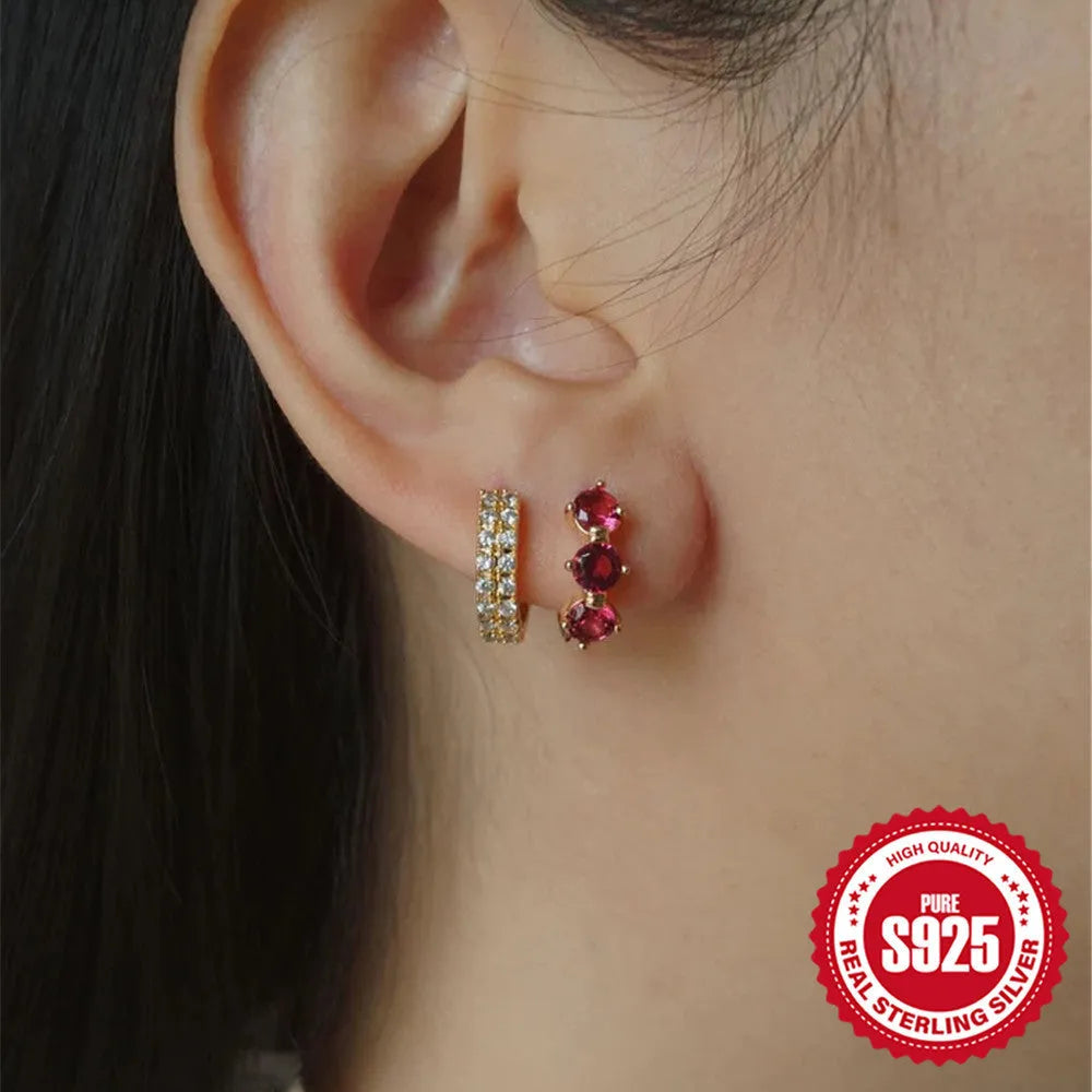 Golden S925 sterling silver sunflower stud earrings with geometric shape and inlaid zircon stones.
