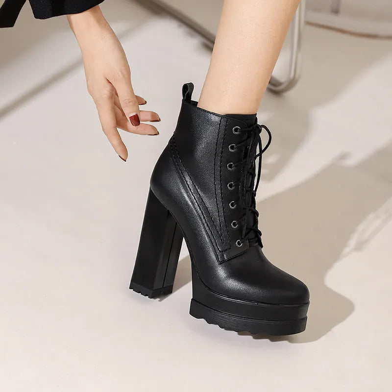 Women's black waterproof platform boots with chunky heel and side zipper