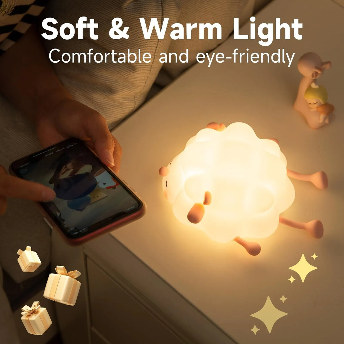 Cute silicone night light sheep cartoon bedroom lamp with warm light, rechargeable, on a bedside table