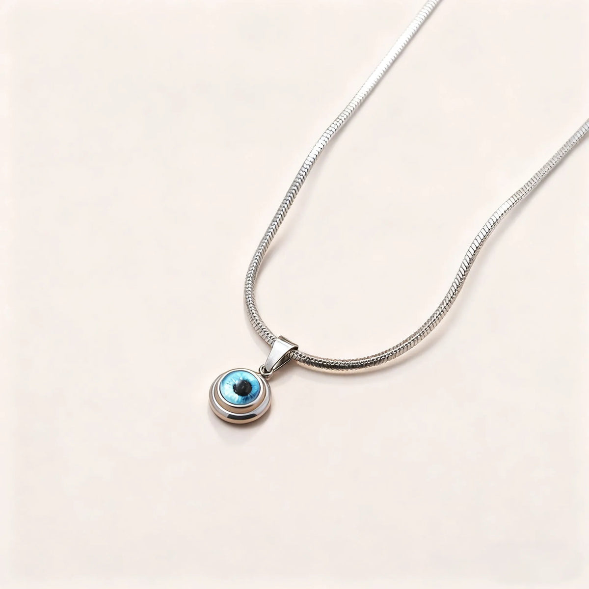 Angel Eyes titanium steel necklace with gold plating and coloured glaze eye pendant on snake bones chain