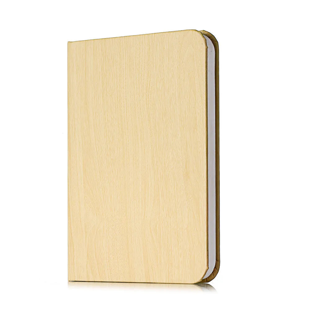 Wooden boy-shaped LED night light in modern style on a wooden base.