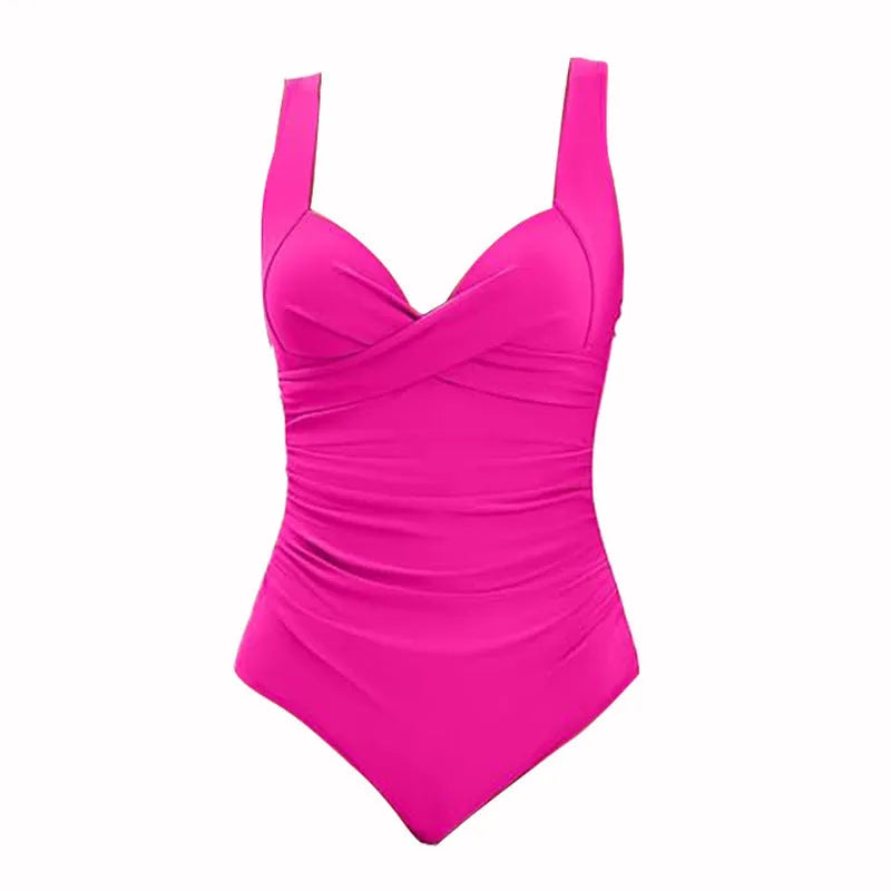 Women's solid colour one-piece swimsuit with push up hard bag design in polyester fabric.